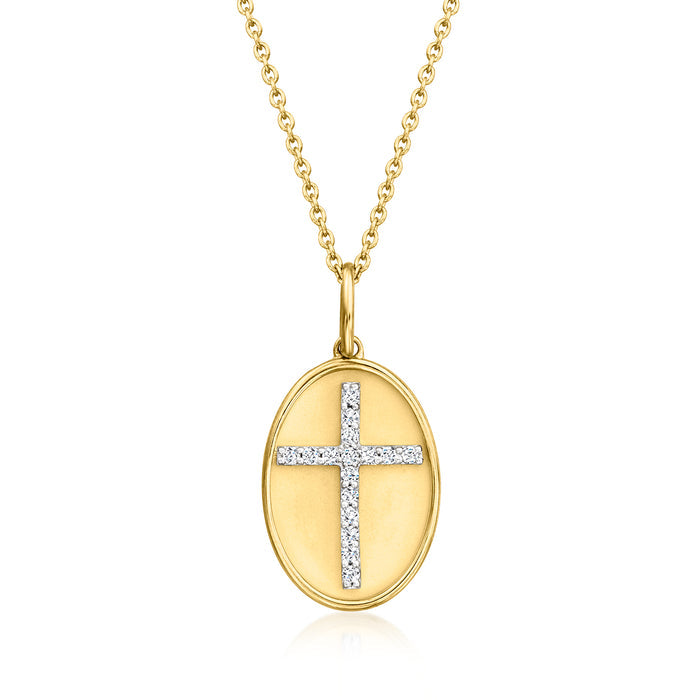 Gold oval pendant necklace with diamond cross on a link chain