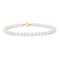 White cultured pearl bracelet with 14kt yellow gold clasp