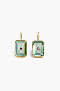 A pair of Lizzie Fortunato rectangle drop earrings with green gemstones in gold-plated brass, each centered with a small red stone.
