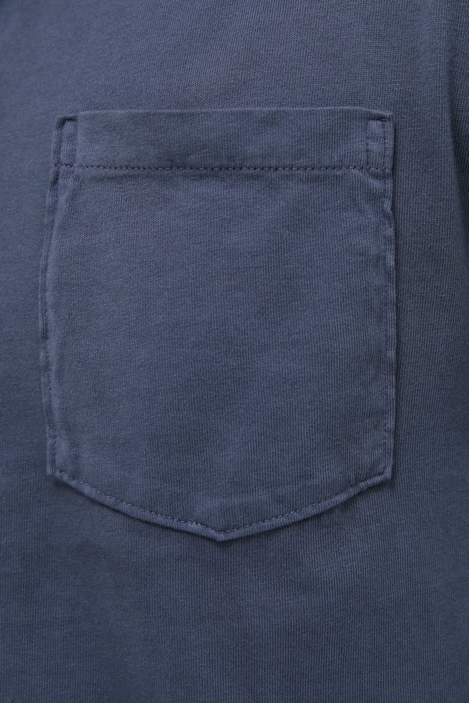 Classic Faded Navy Garment Dyed Long Sleeve Polo, showcasing effortless style with a sewn-on chest pocket and visible stitching detail, crafted from high-end Pima cotton for fun, versatile wear.