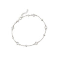 Sterling silver CZ station anklet with small bezel-set round stones