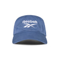 The Reebok Logo Cap features a curved brim and front white logo embroidery. Made from cotton twill with an adjustable buckle for comfort, this cap is shown against a white background.