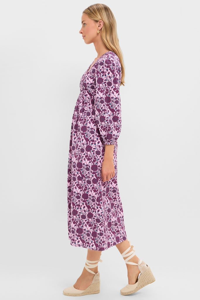 Model wearing the Mauve and Wine Floral Chloe Midi Dress with a V-neck and three-quarter balloon sleeves, paired effortlessly with beige espadrille wedge sandals for a classic, high-end look.
