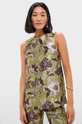 Woman models the classic Multi Citron Top, featuring an effortless floral print and relaxed silhouette, paired with matching pants for a high-end, fun look.