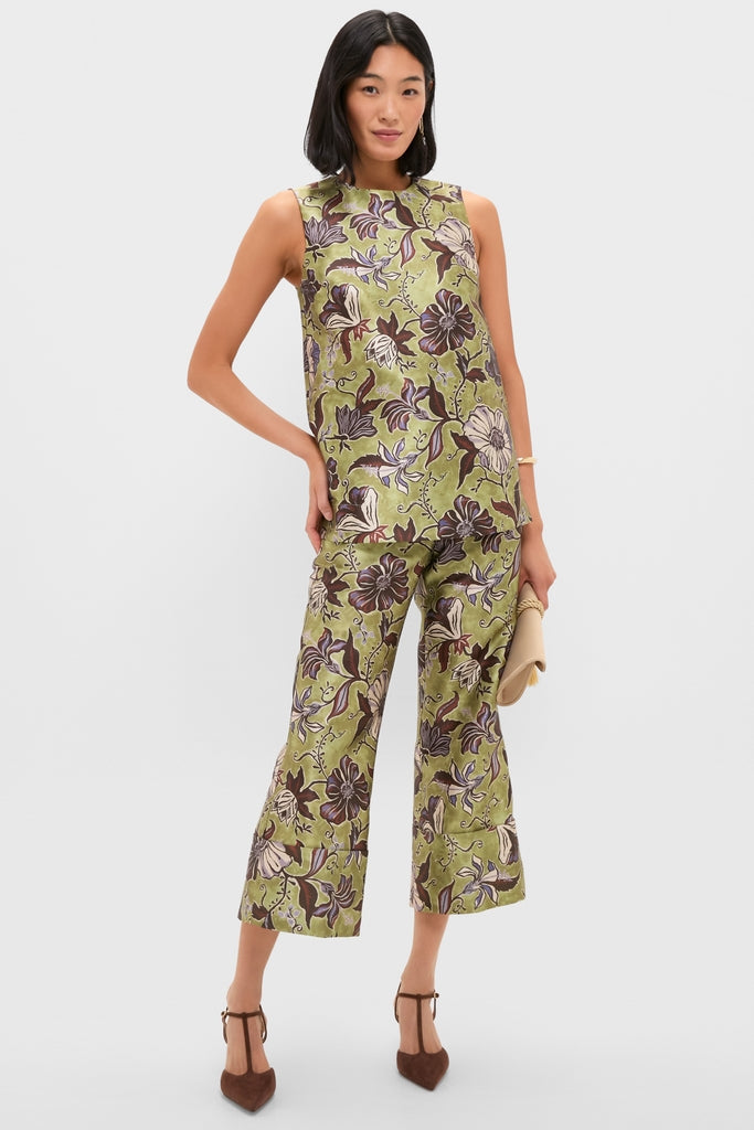Model in a classic, effortless Multi Citron Top with an elegant floral print, styled with matching pants for a chic, high-end look.