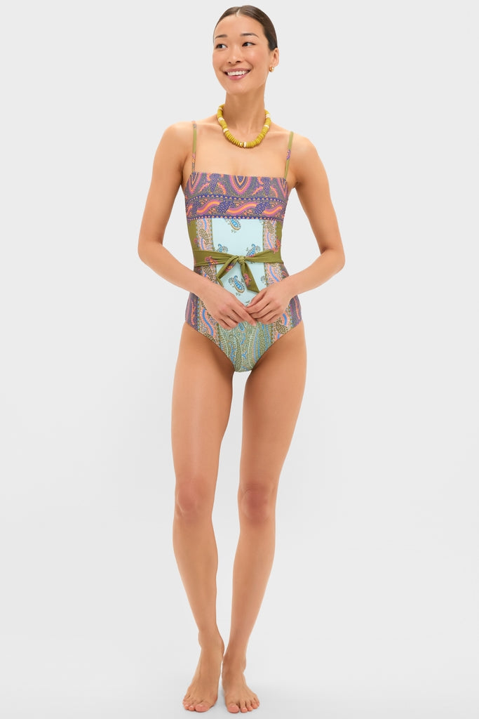 Pastel Patchwork Lucent One Piece swimsuit on a woman, featuring classic paisley prints, adjustable straps, and a self-tie belt, embodying effortless, high-end, and fun bohemian style.