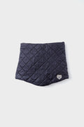 Quilted dark blue cover with diamond pattern and a small logo patch on the lower right, crafted from recycled nylon—an elegant winter accessory from the Powder Puff Collection.