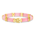 Pink jade bangle bracelet with gold over sterling Good Fortune charm