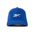 The Reebok Range Cap is a blue baseball hat with a curved brim and a white embroidered logo on the front. Designed for sun protection, it’s shown from the front against a plain white background.