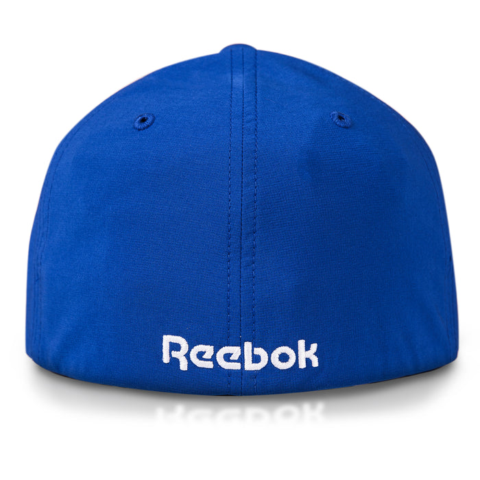 The Reebok Range Cap is a blue golf hat shown from the back, with the white Reebok logo embroidered near the bottom center and crafted from moisture-wicking fabric for comfort.